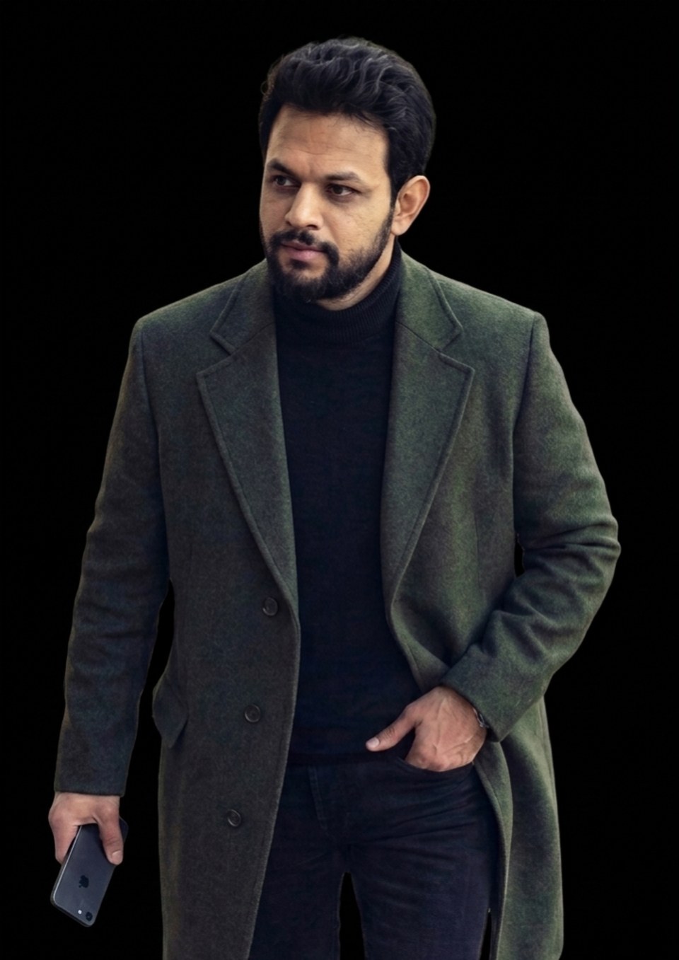 Mrinal Gahlaut, founder and CEO, photographed outdoors in a green overcoat